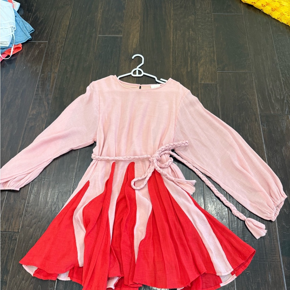 Long sleeve dress with braided belt detail.